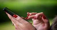 Regulation of mobile wallets through telephone companies